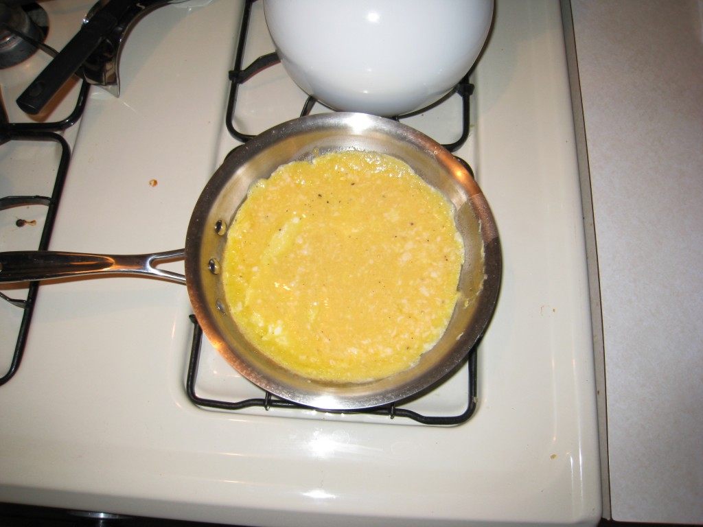 Omelet in progress in a pan