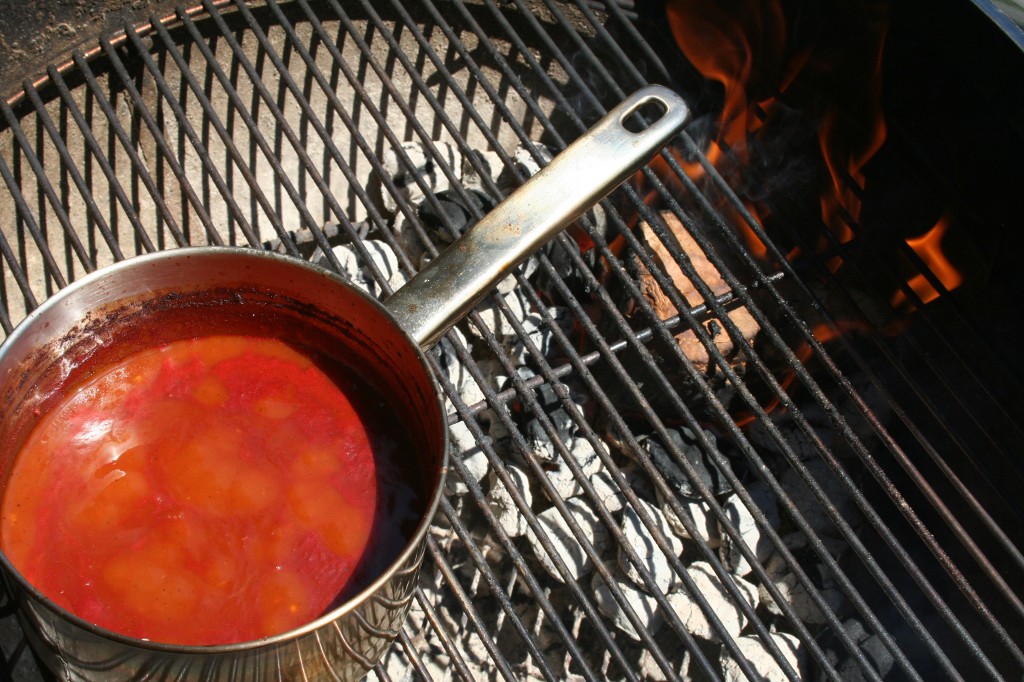 BBQ Sauce cooking on the grill