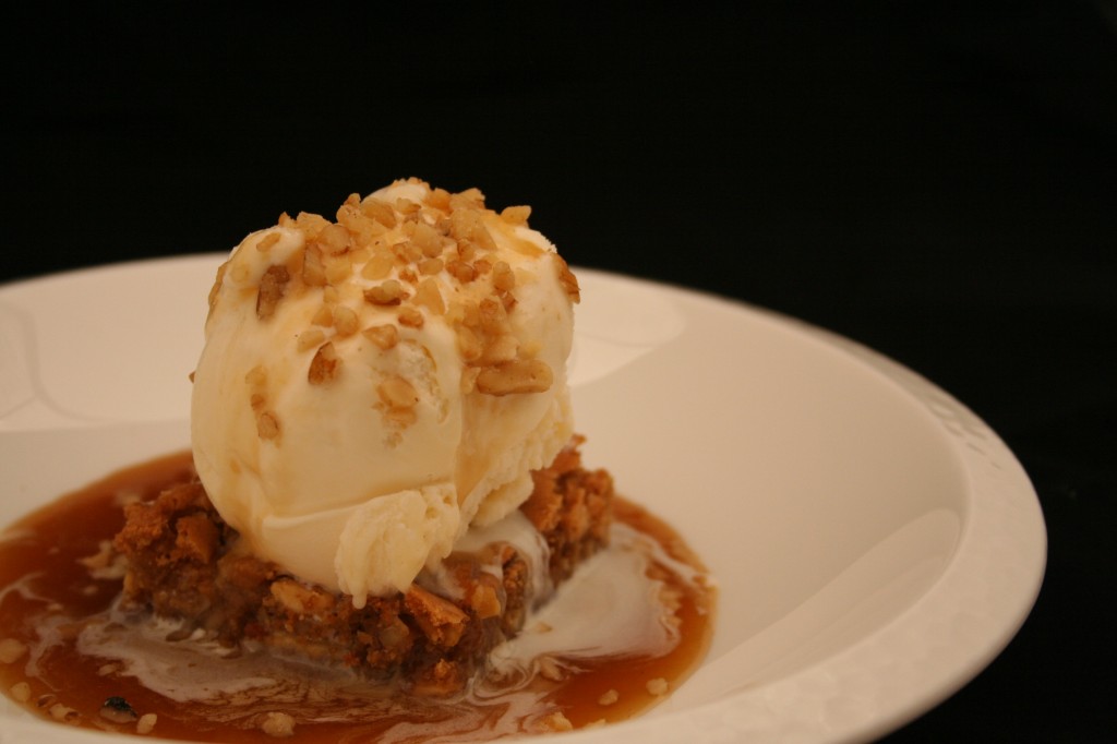 Walnut blondie with ice cream and maple butter sauce