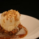 Walnut blondie with ice cream and maple butter sauce